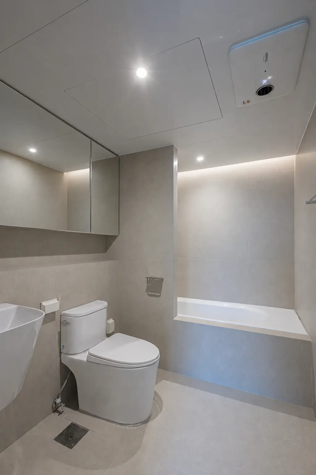 Bathroom and bathtub with mirrored upper cabinet doors; digitally visualized finish