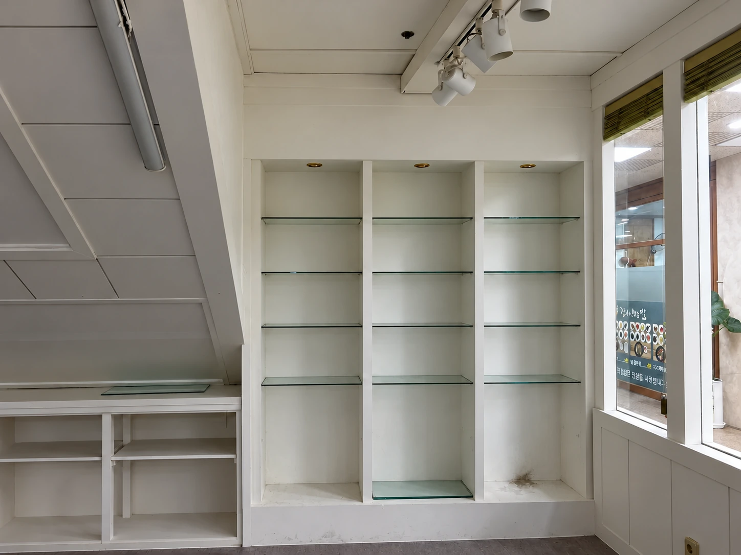 Display wall and window before renovation
