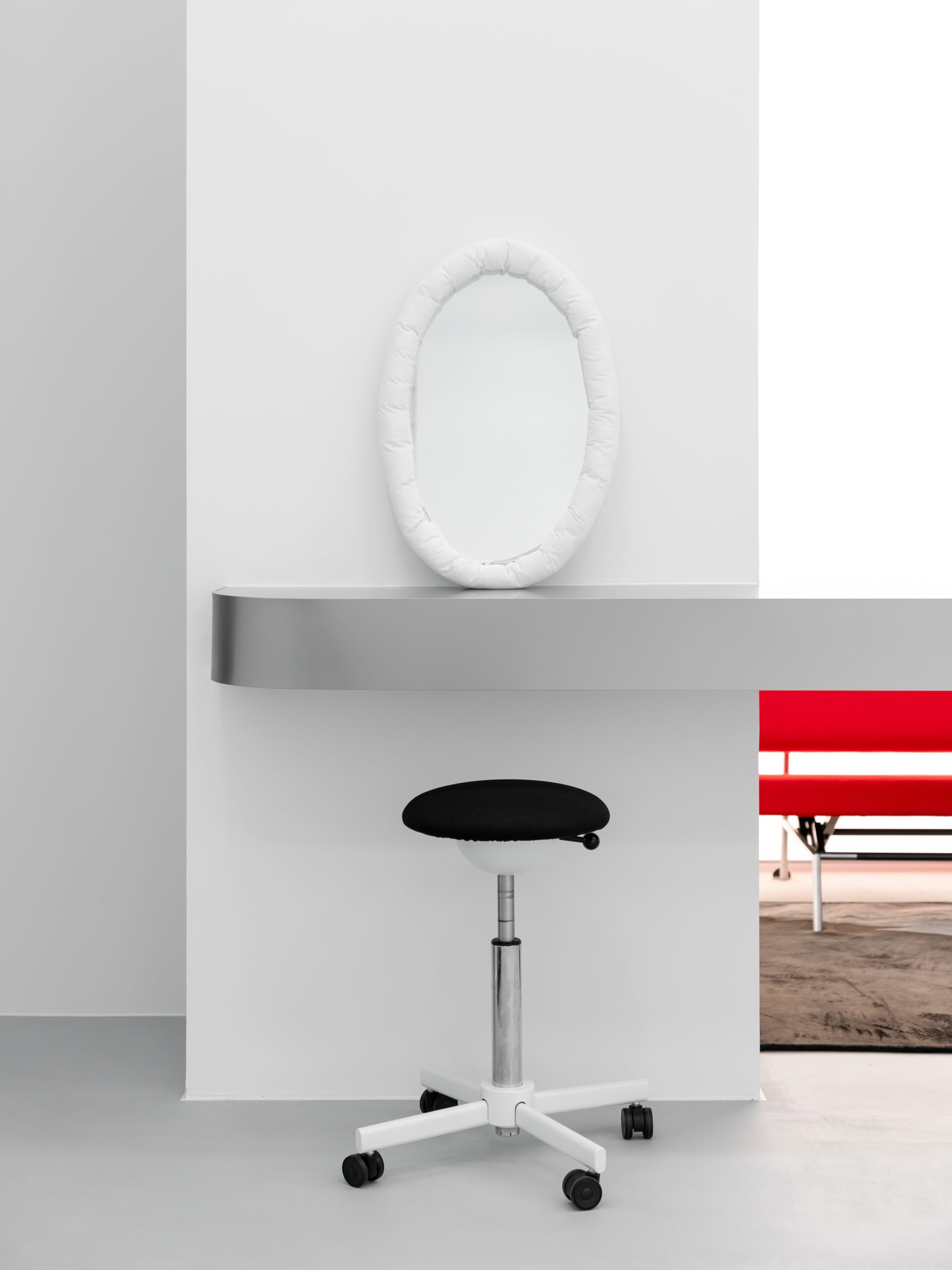 Oval mirror and floating steel makeup shelf
