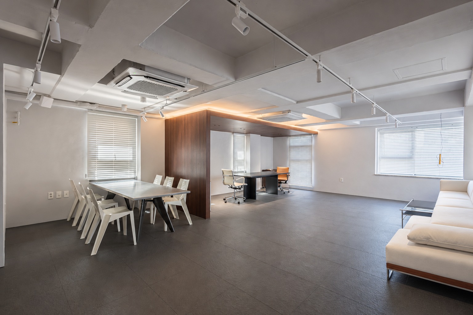 Meeting room viewed across the tiled floor